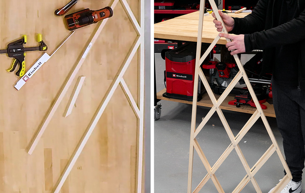 Werkzeuge und zugeschnittene Holzleisten liegen auf einem Tisch; daneben eine fast fertige Holzstruktur in Tannenbaumform.