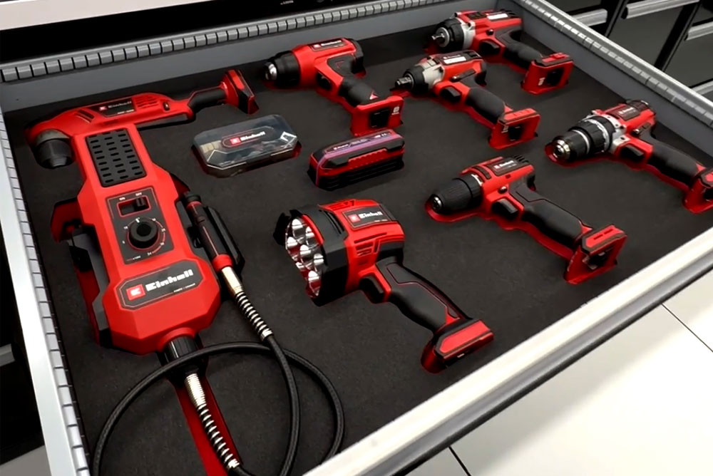 Tiroir soigneusement organisé avec divers outils sans fil Einhell.